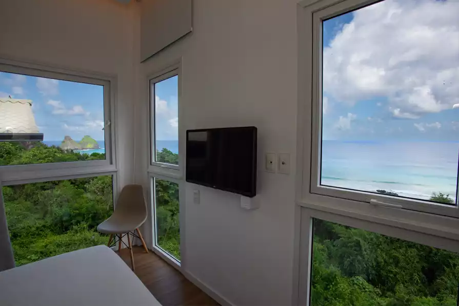 pousada-mar-em-mim-fernando-noronha-home-03-suite-deluxe-com-vista-pro-mar-quarto-05